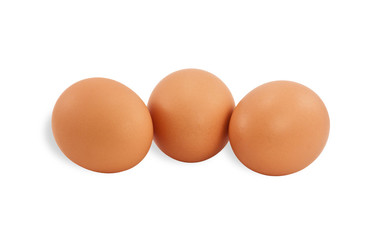Three brown eggs