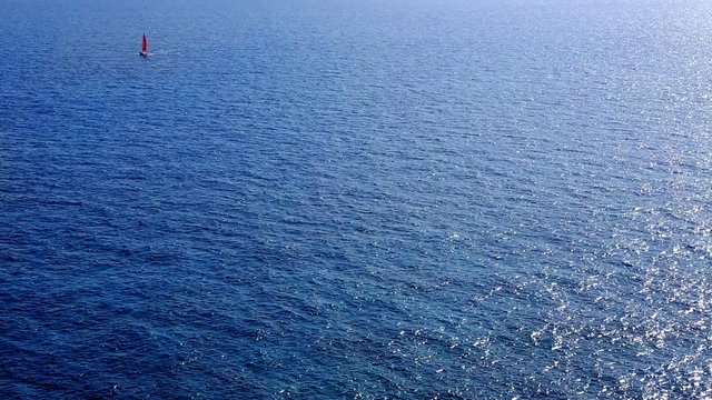 sailboat sailing in deep mediterranean sea offshore
