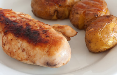Roast chicken and baked potatoes