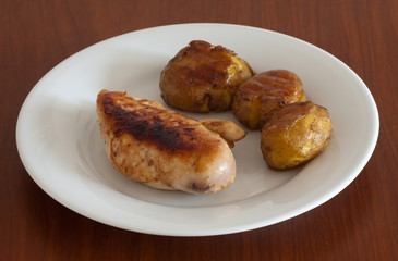 Roast chicken and baked potatoes