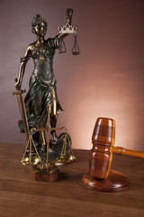 Fototapeta na wymiar Law and justice stuff on wood table and dark background 