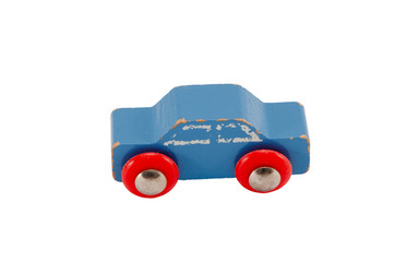 Wooden blue vintage toy car isolated on white