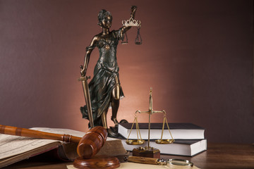 Justice concept with gavel on dark background
