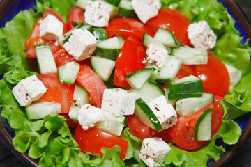 fresh salad with tomato and cucumber. green