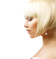 Beautiful Girl with Healthy Short Hair over White