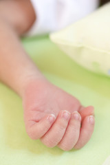 Fototapeta na wymiar Hand of new born baby
