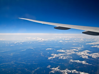 air plane wing and blue sky