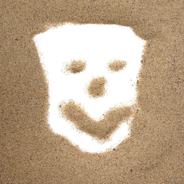 Sand frame with human face