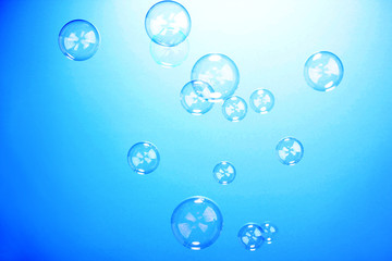Soap bubble on blue background