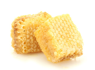 golden honeycombs isolated on white.