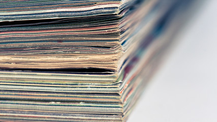 A large stack of magazines piled high.
