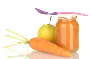 Jar with fruit and vegetables  baby food and spoon isolated