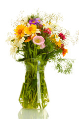 beautiful bouquet of bright  wildflowers in glass vase,