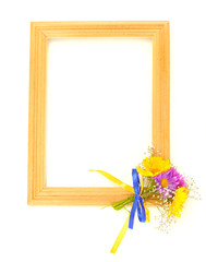 wooden frame with beautiful bouquet of bright  wildflowers,