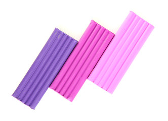 Children bright plasticine isolated on white