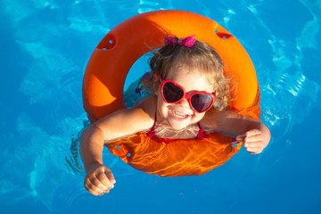 little girl swimming
