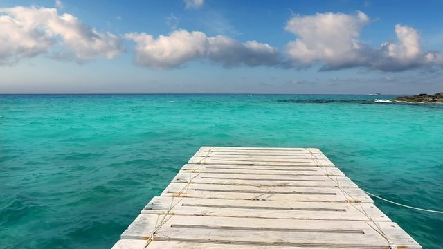beach wooden pier turquoise sea Formentera Balearic islands