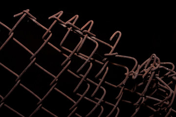 the old iron railing on a black background