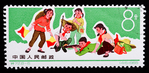 Stamp printed in China shows image of children playing shooting