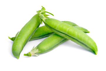 Green peas pods on white background