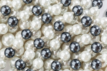 String of black and white pearls