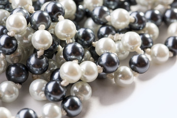 String of black and white pearls