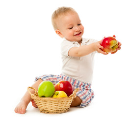 Fototapeta premium Child with basket of apples