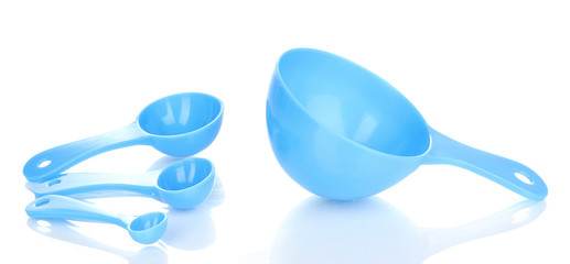 Blue measuring spoons isolated on white