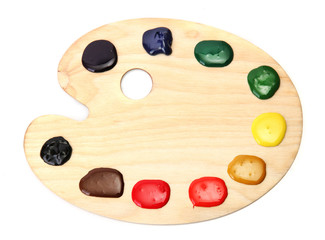wooden art palette with paint isolated on white