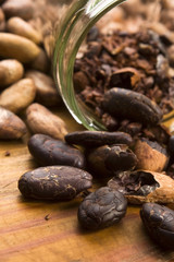 Cocoa (cacao) beans on natural wooden table