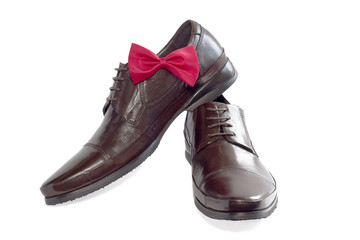 Concept of a fashion for the man - shoes and bow tie