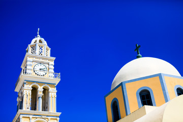 Fototapeta premium church, and clock tower at santorini