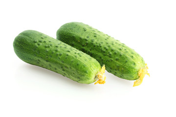 Fresh cucumbers isolated on white.
