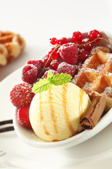 Waffle with fresh berries and ice-cream