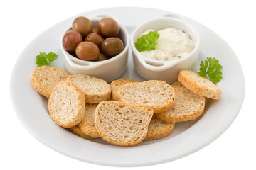 toasts with olives and sauce