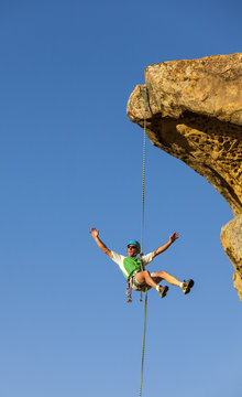 Climber rappelling from the summit.