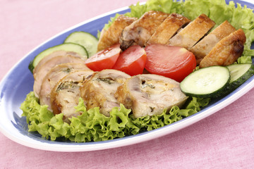 Tasty meat cutlet with garnish on plate