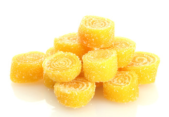 yellow jelly candies isolated on white.
