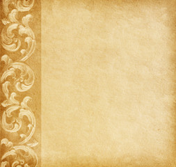 Old worn paper with floral border.