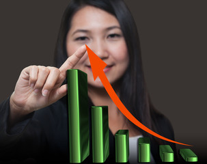 Business woman touching arrow of growth graph
