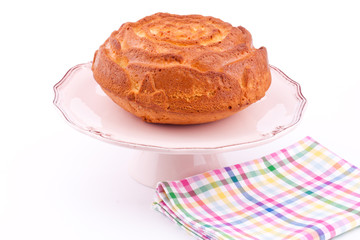 vanilla cake on stand
