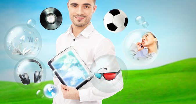 Adult handsome man holding tablet computer. Icons of different o