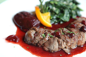 Duck confit , Roasted duck with blueberry sauce