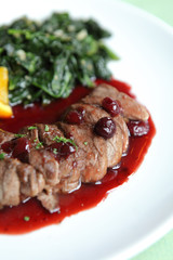 Duck confit , Roasted duck with blueberry sauce