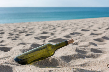 message in a bottle at beach