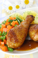 Chicken leg with vegetables and sauce