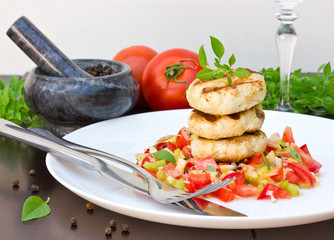 Burgers grilled and tomato salad