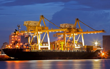 Fototapeta premium Cargo Ships at dusk
