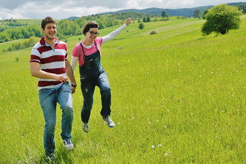 Portrait of romantic young couple smiling together outdoor