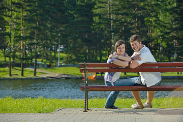 Portrait of romantic young couple smiling together outdoor